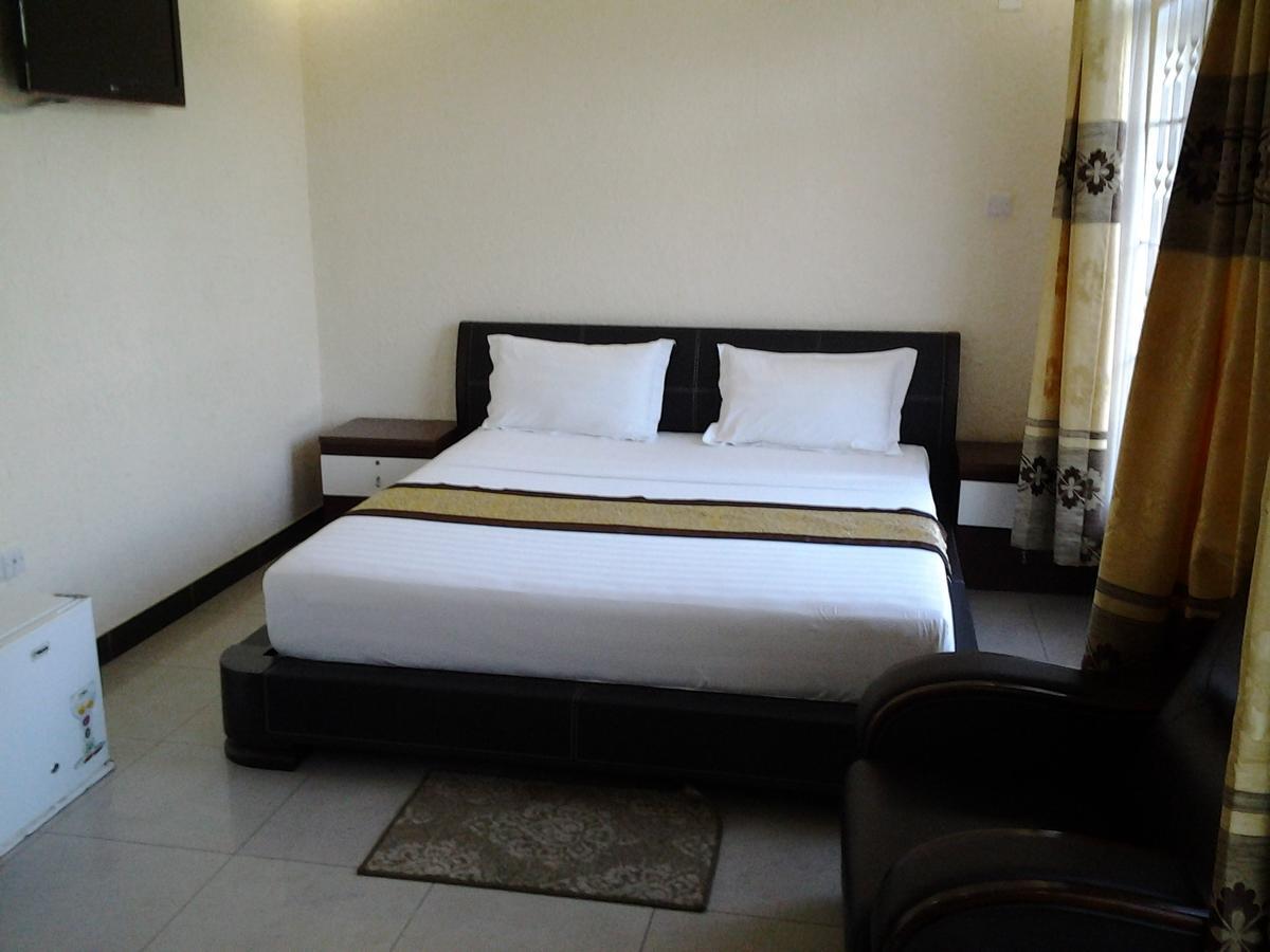 Best Point Hotel Дар-ес-Салам Номер фото